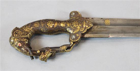 A fine Indian sword tulwar, late 19th century, L 77cm (blade)